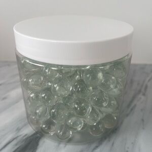 Clear Glass Marbles in Jar